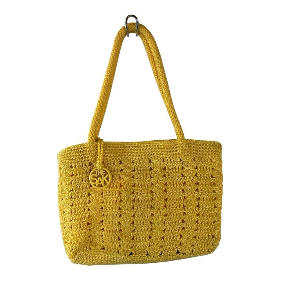 The Sak yellow crochet‎ shoulder bag peace12"x8"metal tassel